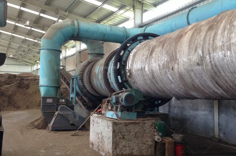 Rotary dryer is drying the gypsum on worksite.